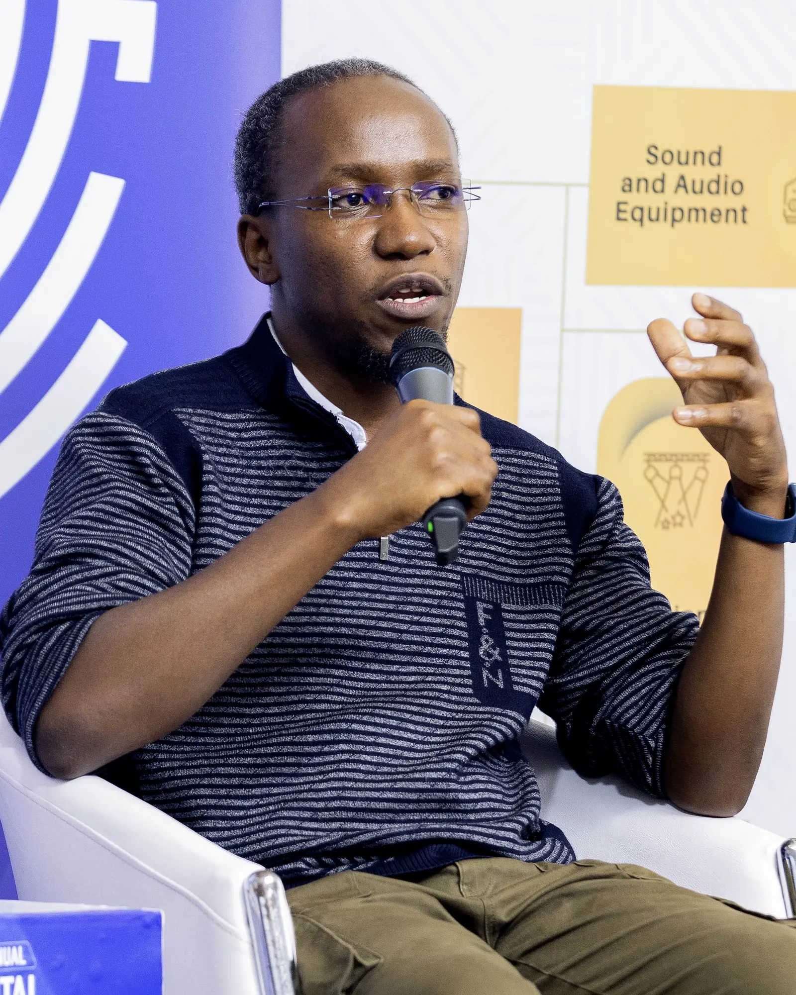 John Ssenkeezi speaking at a UDS event